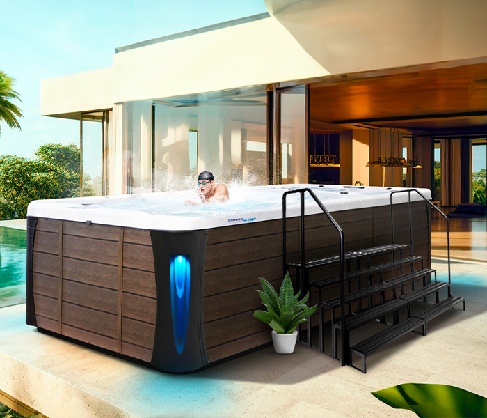 Calspas hot tub being used in a family setting - Woodland